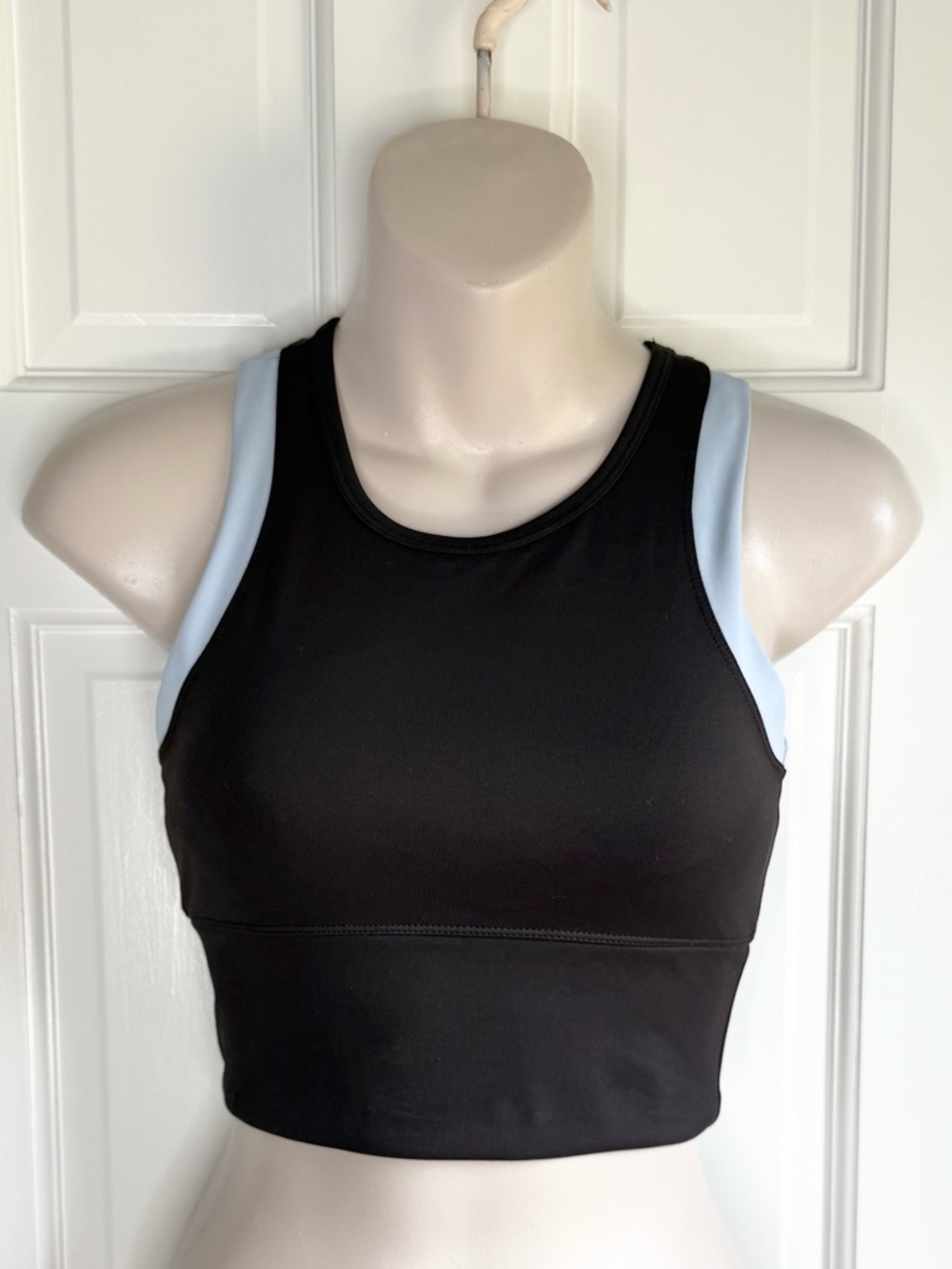 High-Neck Crop Sports Bra in Black with Light Blue Trim